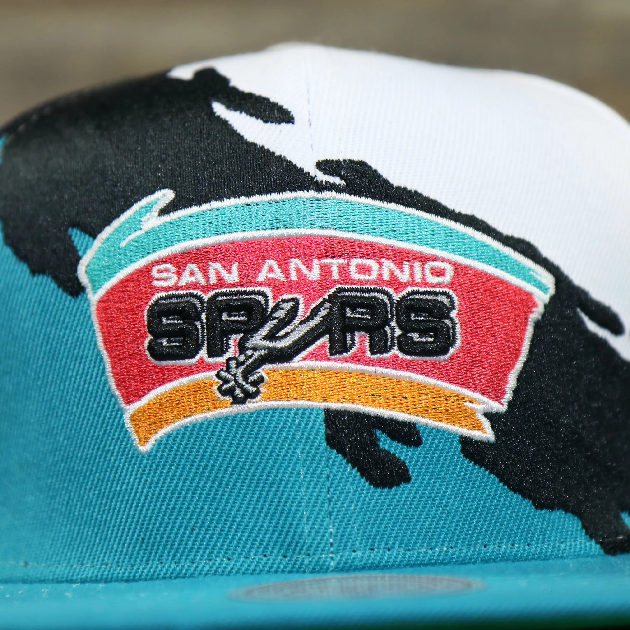 San Antonio Spurs Vintage Retro NBA Paintbrush Mitchell and Ness Snapback Hat | Teal/White/Black